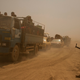 Hundreds of civilians flee villages outside Mosul the day after Iraqi Kurdish forces launch an operation east of Islamic State-held Mosul on Monday, Aug. 15, 2016.